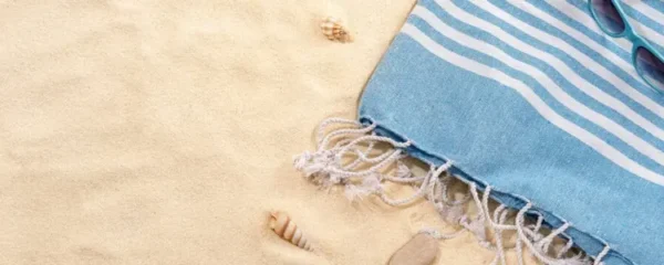 personnalisez votre experience de plage avec une fouta unique a votre image